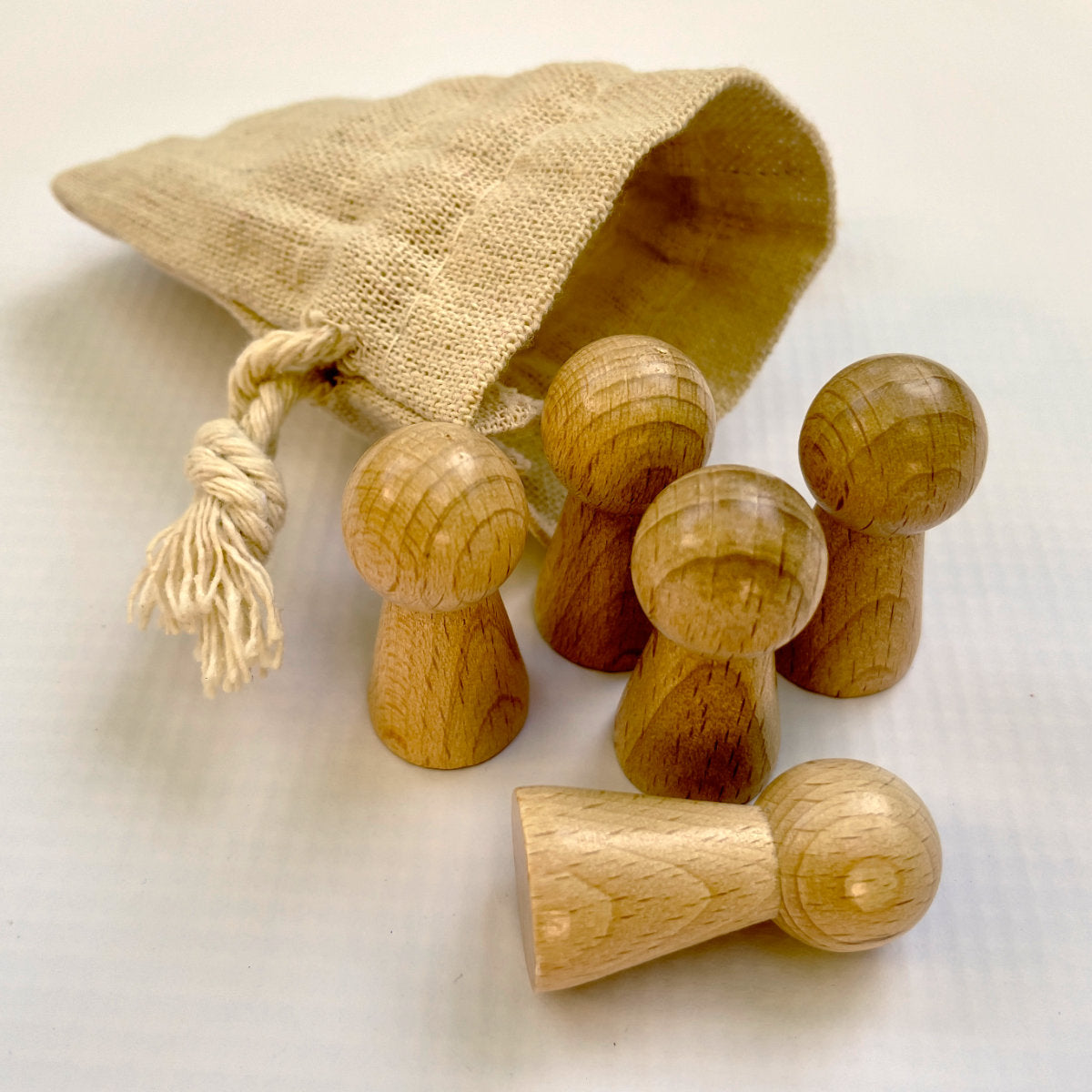 5 Holzfiguren im Leinenbeutel für Supervisionsprozesse